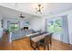 Open concept dining area with modern lighting and a view of the living room at 1209 River Rock Rd, Hanahan, SC 29410