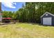 Large backyard features a patio, shed and grassy area at 1233 Updyke Dr, Johns Island, SC 29455