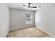 A bedroom with a ceiling fan and a window letting in natural light at 1233 Updyke Dr, Johns Island, SC 29455