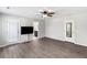 Bright bedroom with stylish gray flooring, a ceiling fan, with access to the bathroom and outdoor exit at 1233 Updyke Dr, Johns Island, SC 29455