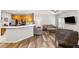 Open-concept living area connects to the kitchen and offers lots of seating and a ceiling fan at 1233 Updyke Dr, Johns Island, SC 29455