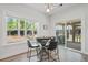 Cozy breakfast nook featuring an outdoor view, with a modern table and chairs near a sliding door at 1325 Wannamaker Ave, Summerville, SC 29485