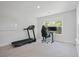 Bright exercise room featuring a treadmill, computer desk, and natural light at 1325 Wannamaker Ave, Summerville, SC 29485