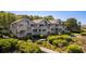 Stunning aerial shot of beachfront community featuring boardwalks, coastline and coastal vegetation at 1342 Pelican Watch Villas, Seabrook Island, SC 29455