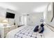 Comfortable bedroom with a TV, soft lighting, and a serene atmosphere for relaxation at 1342 Pelican Watch Villas, Seabrook Island, SC 29455