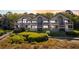 Charming beach condos feature balconies and stairs leading to beautiful landscaping with a glimpse of the ocean at 1342 Pelican Watch Villas, Seabrook Island, SC 29455