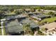 A large set of tennis courts and mature palm trees create a visually appealing athletic complex at 1342 Pelican Watch Villas, Seabrook Island, SC 29455