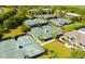 Aerial view of a large tennis complex surrounded by trees and some residential buildings in the background at 1342 Pelican Watch Villas, Seabrook Island, SC 29455