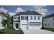 Charming two-story home with a three-car garage, well-maintained lawn and attractive curb appeal at 139 Seaton St, Summerville, SC 29486