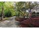Quaint street leading up to a charming house with stairs and inviting curb appeal at 1392 Eden Rd, Awendaw, SC 29429