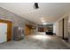 Spacious garage with concrete floor and storage area at 1392 Eden Rd, Awendaw, SC 29429