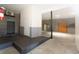 Large garage with grey and white walls and concrete floor at 1392 Eden Rd, Awendaw, SC 29429