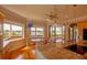 Open kitchen with granite countertops, island seating, scenic views and access to a deck at 1392 Eden Rd, Awendaw, SC 29429