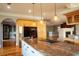Spacious kitchen with stainless steel appliances and granite countertops offers modern elegance at 1392 Eden Rd, Awendaw, SC 29429