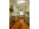 Bright laundry room featuring custom cabinetry, sink, and modern washer and dryer for convenient chores at 1392 Eden Rd, Awendaw, SC 29429