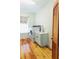 Well-appointed laundry room with modern appliances, sink, and cabinetry for efficient laundry tasks at 1392 Eden Rd, Awendaw, SC 29429