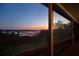 Evening view of water and shoreline at 1392 Eden Rd, Awendaw, SC 29429