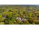 Aerial neighborhood view with homes nestled among lush green trees and landscaping at 1409 Lieben Rd, Mount Pleasant, SC 29466