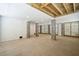 Spacious unfinished basement with concrete floors, concrete pillars, and wood ceiling beams at 1409 Lieben Rd, Mount Pleasant, SC 29466