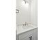 Elegant half-bathroom featuring a modern sink, vanity, and updated light fixture at 1409 Lieben Rd, Mount Pleasant, SC 29466