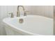 Close up of white soaking tub with brushed nickel hardware at 1409 Lieben Rd, Mount Pleasant, SC 29466