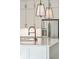 A modern kitchen island with a white countertop, stainless steel appliances, and a black kitchen faucet at 1409 Lieben Rd, Mount Pleasant, SC 29466
