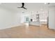 Bright living room showcasing an open floor plan with a modern kitchen at 1409 Lieben Rd, Mount Pleasant, SC 29466