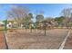 Community playground featuring a swing set, play structure, and a picnic table under a yellow awning at 1436 Harbor Mist Ct, Charleston, SC 29492