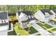 A beautifully landscaped property featuring manicured lawns and mature trees surrounding the home at 149 Caleb Ct, Ladson, SC 29456
