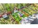 An expansive backyard featuring a shed, a hot tub, mature trees, and a privacy fence at 149 Caleb Ct, Ladson, SC 29456