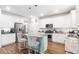 Bright kitchen features white cabinets, stainless steel appliances, granite countertops, and a breakfast bar with barstool seating at 149 Caleb Ct, Ladson, SC 29456