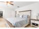 Bedroom with bed, dresser, mounted lights, and en suite bath with a walk-in closet at 149 Caleb Ct, Ladson, SC 29456