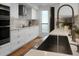 Well-lit kitchen boasts stainless steel appliances, and white marble countertops at 1603 Ventura Pl, Mount Pleasant, SC 29464