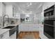 Bright kitchen featuring stainless steel appliances, and white cabinets at 1603 Ventura Pl, Mount Pleasant, SC 29464