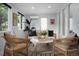 Cozy sunroom featuring wicker chairs, stylish decor, and plenty of natural light at 1603 Ventura Pl, Mount Pleasant, SC 29464