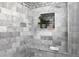 Close up of marble shower with built-in shelf at 1603 Ventura Pl, Mount Pleasant, SC 29464