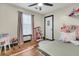 Cozy bedroom features wood floors, natural light and decor at 1628 Point Park Dr, Johns Island, SC 29455
