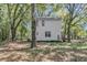 Exterior of a two-story house with white siding and mature trees at 1628 Point Park Dr, Johns Island, SC 29455