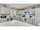 Bright kitchen featuring white appliances, white countertops, and decorative backsplash at 1628 Point Park Dr, Johns Island, SC 29455