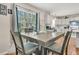 Charming kitchen boasts updated white cabinets, stainless steel appliances, and a cozy breakfast nook at 1628 Point Park Dr, Johns Island, SC 29455