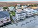 Aerial view of beach homes showing neighborhood homes near the beach at sunset at 1681 E Ashley Ave # A, Folly Beach, SC 29439