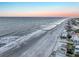 Gorgeous aerial view of the beach, homes, and the Atlantic ocean at sunrise at 1681 E Ashley Ave # A, Folly Beach, SC 29439