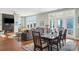 Open-concept layout with dining and living spaces and lots of natural light at 1681 E Ashley Ave # A, Folly Beach, SC 29439