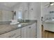 Bathroom featuring granite countertops, ample cabinet space, and neutral tones at 1681 E Ashley Ave # B, Folly Beach, SC 29439