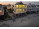 Beautifully lit multi-story beach house with multiple balconies and stairs to the beach at 1681 E Ashley Ave # B, Folly Beach, SC 29439