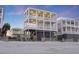 Three-story beach house with multiple decks offering stunning ocean views and beach access at 1681 E Ashley Ave # B, Folly Beach, SC 29439