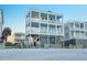 Stunning three-story beach house with elevated decks and panoramic ocean views at 1681 E Ashley Ave # B, Folly Beach, SC 29439