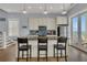 Well-equipped kitchen with stainless steel appliances and access to an ocean view balcony at 1681 E Ashley Ave # B, Folly Beach, SC 29439