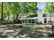 A spacious backyard featuring a screened in porch and playground set at 1812 Overrun St, Charleston, SC 29414