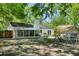 A spacious backyard featuring a screened in porch and playground set at 1812 Overrun St, Charleston, SC 29414